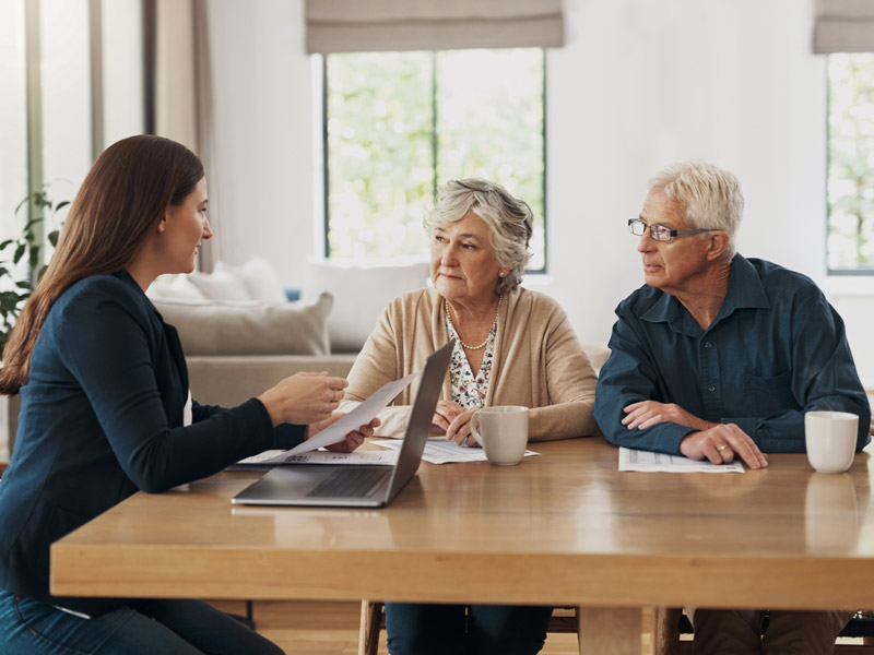 couple talking to probate specialist at home